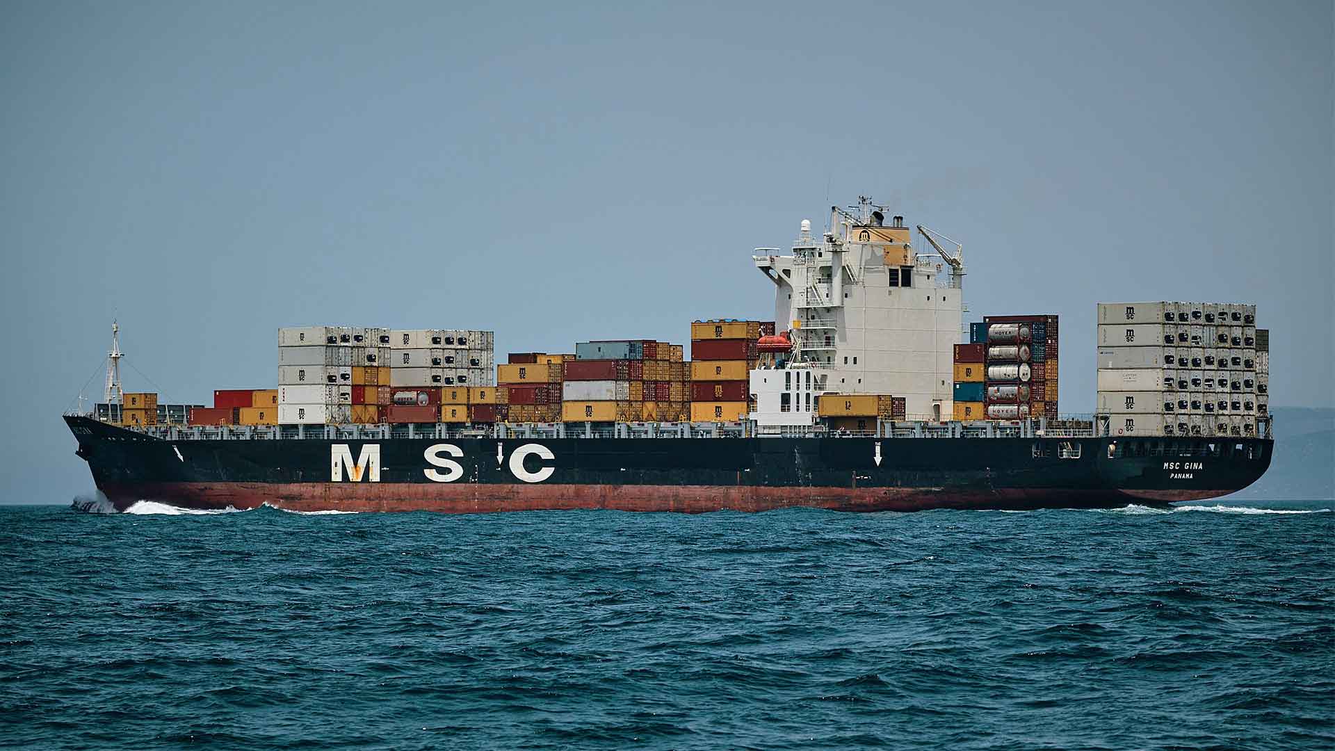 Container ship moving sea freight across open water